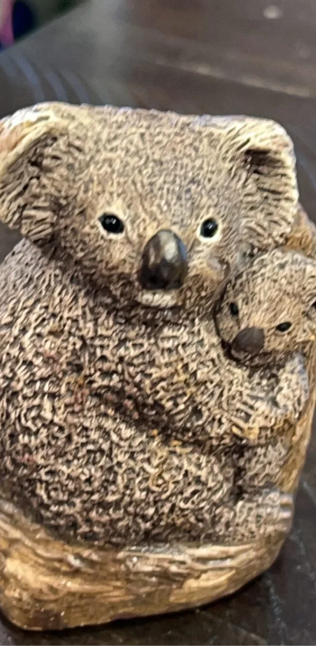 1982 Bandanna Sculptures and cub figurine made of a textured stone-like material